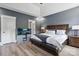 Comfortable main bedroom with a king-size bed and bedside tables, as well as a nice fish tank at 139 Sheep Path Dr, Mooresville, NC 28115