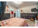 Unique bedroom featuring chalkboard paint, pink trim and decorative wall decals at 154 Tanner Loop, Troutman, NC 28166