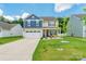 Charming two-story home with landscaped yard, attached garage and covered front porch at 154 Tanner Loop, Troutman, NC 28166