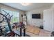 Fully equipped home gym with ample workout space and natural light at 154 Tanner Loop, Troutman, NC 28166