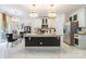 Modern kitchen with granite counters, stainless appliances, and open layout at 154 Tanner Loop, Troutman, NC 28166