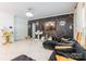 Spacious living room with accent wall, stylish tile floors and modern decor at 154 Tanner Loop, Troutman, NC 28166