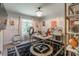 Bright office space with a stylish chandelier, modern desk, and elegant decor at 154 Tanner Loop, Troutman, NC 28166