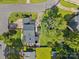 An aerial view of a well-maintained home with a lush green yard and mature trees at 1632 Kimberly Dr, Gastonia, NC 28052