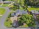 Aerial view of the property showcasing the home, gardens, driveway, and surrounding neighborhood at 1632 Kimberly Dr, Gastonia, NC 28052