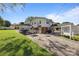 Wide open backyard featuring basketball, patios, and trailer storage at 1632 Kimberly Dr, Gastonia, NC 28052