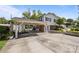 Side view of home with a carport and open patio with an exterior entrance at 1632 Kimberly Dr, Gastonia, NC 28052