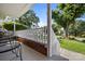 Cozy porch with chairs and a view of the lawn and mature trees at 1632 Kimberly Dr, Gastonia, NC 28052