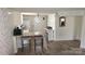 Cozy kitchen with an eat-in bar with gray counter and stool seating, and white appliances at 1632 Kimberly Dr, Gastonia, NC 28052