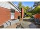 Outdoor patio space featuring brick accents, perfect for relaxation and entertaining at 1632 Kimberly Dr, Gastonia, NC 28052