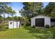 Backyard storage with garage doors at 1632 Kimberly Dr, Gastonia, NC 28052