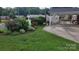 Lush green lawn and landscaping enhance the curb appeal of this inviting home at 1632 Kimberly Dr, Gastonia, NC 28052