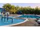 Resort-style community pool featuring a splash pad, area, and plenty of lounge chairs at 17729 Trolley Crossing Way, Cornelius, NC 28031