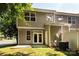 Exterior view of backyard featuring a patio, siding, well-maintained lawn, and double glass doors at 2273 Aston Mill Pl, Charlotte, NC 28273