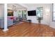 Bright and open living room featuring beautiful hardwood floors and lots of natural light at 2273 Aston Mill Pl, Charlotte, NC 28273