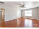 Spacious bedroom with ceiling fan, hardwood floors and windows at 2357 Riding Trail Rd, Gastonia, NC 28054