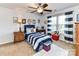 Bedroom featuring nautical decor, ceiling fan and window views at 27246 Preston Pl, Fort Mill, SC 29707