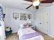 Bedroom features ceiling fan, decor and double door closet at 27246 Preston Pl, Fort Mill, SC 29707