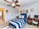 Nautical themed bedroom with ceiling fan and double closets at 27246 Preston Pl, Fort Mill, SC 29707