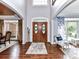 Inviting foyer with hardwood floors, stylish decor, and a view to multiple rooms at 27246 Preston Pl, Fort Mill, SC 29707