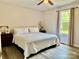 Cozy bedroom with neutral tones, light colored carpet and curtains, and ample natural light at 2921 Heavners Farm Ct, Lincolnton, NC 28092