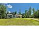 Inviting single-story home with well-manicured lawn and charming curb appeal on a sunny day at 2921 Heavners Farm Ct, Lincolnton, NC 28092