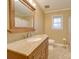Bathroom featuring a vanity and window at 3113 Old Pageland Marshville Rd, Wingate, NC 28174