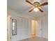 Bedroom featuring a ceiling fan and closet storage at 3113 Old Pageland Marshville Rd, Wingate, NC 28174