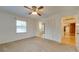 Cozy bedroom with a ceiling fan, a window, and closet storage at 3113 Old Pageland Marshville Rd, Wingate, NC 28174