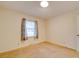 Carpeted bedroom with a window and neutral-colored walls at 3113 Old Pageland Marshville Rd, Wingate, NC 28174