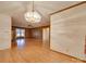 Spacious living area with wood paneling and light-colored wood-look floors at 3113 Old Pageland Marshville Rd, Wingate, NC 28174