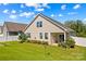 This backyard has an immaculate lawn, white fence, patio and attractive landscaping at 3835 Norman View Dr, Sherrills Ford, NC 28673