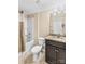 Cozy bathroom featuring granite countertop, tile flooring, and a shower-tub combo at 3835 Norman View Dr, Sherrills Ford, NC 28673