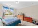 Comfortable bedroom with a window view, dresser, and a soft, inviting atmosphere at 3835 Norman View Dr, Sherrills Ford, NC 28673