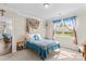 Cozy bedroom featuring natural light, decorative curtains, and calming accents at 3835 Norman View Dr, Sherrills Ford, NC 28673