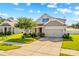 Charming two-story home with a well-manicured lawn and attached two-car garage on a sunny day at 3835 Norman View Dr, Sherrills Ford, NC 28673