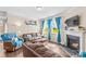 Inviting living room with a fireplace, bright windows and hardwood floors at 3835 Norman View Dr, Sherrills Ford, NC 28673