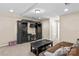 Spacious living room with large entertainment center and comfortable seating area at 3835 Norman View Dr, Sherrills Ford, NC 28673