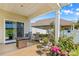 View of a covered patio featuring seating, a small table, and views of the back yard at 3835 Norman View Dr, Sherrills Ford, NC 28673