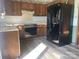 Classic kitchen with wood cabinets, laminate countertops, and stainless steel appliances at 3973 English Oak Dr, Lincolnton, NC 28092