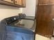 Convenient laundry room with top-of-the-line Samsung washer and dryer machines at 3973 English Oak Dr, Lincolnton, NC 28092