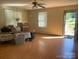 Bright living room with hardwood floors, neutral walls, and lots of natural light at 3973 English Oak Dr, Lincolnton, NC 28092