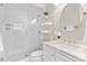 Modern bathroom featuring a glass-enclosed shower, vanity with marble countertop, and elegant fixtures at 404 Wakefield Dr # C, Charlotte, NC 28209