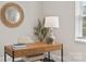 Inviting home office with a wooden desk, cozy chair, and stylish decor, perfect for productivity and comfort at 404 Wakefield Dr # C, Charlotte, NC 28209