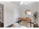 Bright home office featuring a modern desk, stylish decor, and ample natural light, creating an inviting workspace at 404 Wakefield Dr # C, Charlotte, NC 28209
