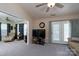 Open concept living room with doors to the outside, plenty of light, and neutral colors at 407 Hertling Nw Dr, Concord, NC 28027