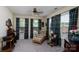 Cozy sitting room with plenty of windows and natural light; comfortable sitting area at 407 Hertling Nw Dr, Concord, NC 28027