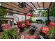 Covered outdoor patio with comfortable seating and a grill, perfect for entertaining at 512 Veloce Trl, Fort Mill, SC 29715