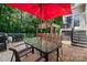 Backyard patio with a built-in grill, table, and ample room for outdoor seating at 512 Veloce Trl, Fort Mill, SC 29715