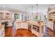 Spacious kitchen with granite counters, stainless appliances and large windows for natural light at 600 Beauhaven Ln, Waxhaw, NC 28173